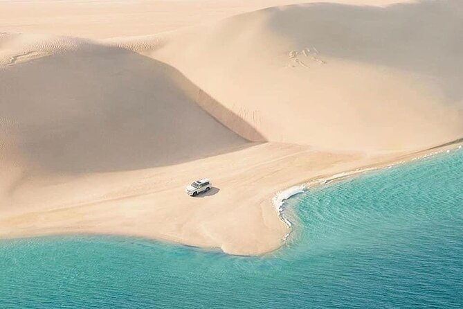 4hr Desert Safari: Sunset,Sunrise,Camel,Sand boarding,Inland Sea - Reaching the Inland Sea near Saudi Arabia