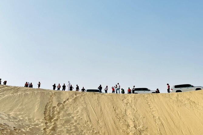 Desert Safari Combo: Camel Ride, Sandboarding & Inland Sea Visit - One hour of dune bashing beside the Arabian Gulf