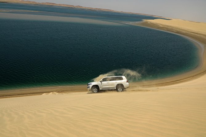 Desert Safari with Camel Ride, Sand Boarding & Inland Sea Tour in Doha - Key points at a glance