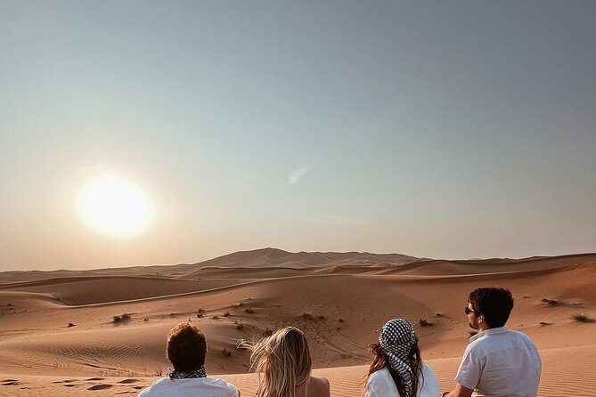 Desert Safari with Quad Bike Camel ride ,SandBoarding ,InalndSea - Your first desert stop includes camel time and coffee
