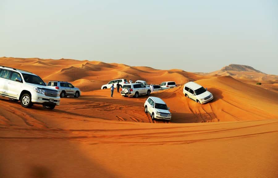 Doha: ATV/Desert Safari with Activities and Inland Sea Stop - Sunset photo stops and the guide’s role