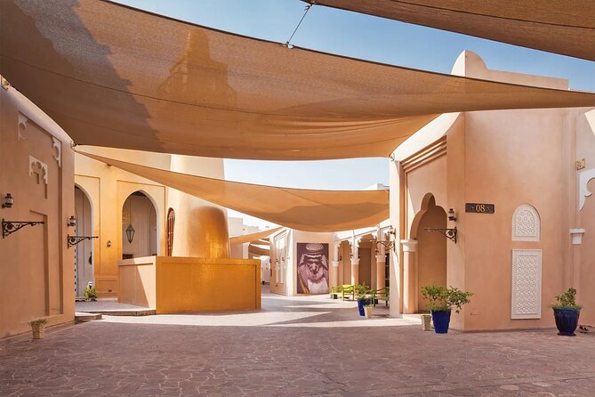 Doha City Tour With Traditional Dhow Cruise - What the guide adds to the experience