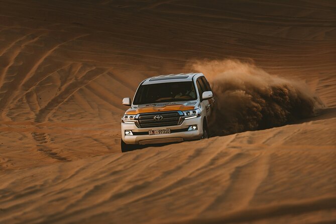 Doha Delights City Tour with Desert Safari and Inland Sea Visit - Pearl Island and the Lusail photo stop
