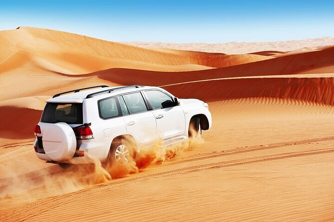 Doha Desert Safari Camel Ride, Sandboarding and Inland Sea - 4x4 dune bashing with an experienced driver