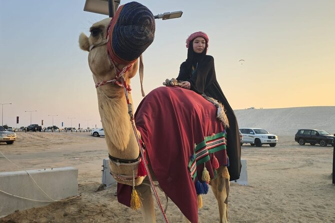 Doha Desert Safari Dune Bashing Camel Ride - Sandboarding for a more active stop