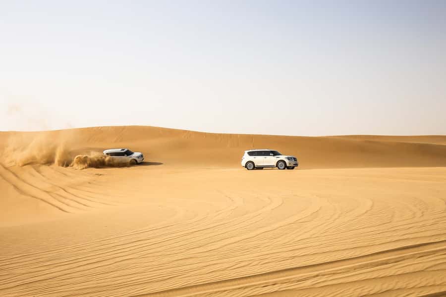Doha: Desert Safari Dune Bashing, Sandboarding, & Camel Ride - The Inland Sea, where sand reaches the Gulf