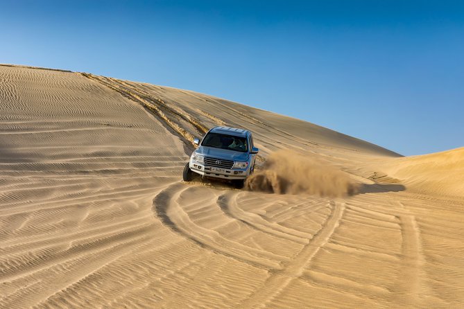 Doha Desert Safari: Dunebashing, Camel, Sandboarding & Inland Sea - Guides shape the quality of the day