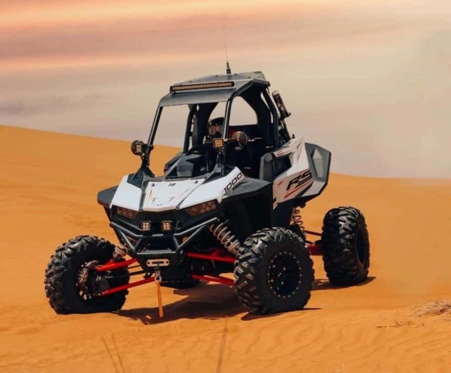 Doha: Desert Safari, Quad Biking, Sand Boarding & Camel Ride - Dune bashing in a 4WD Toyota