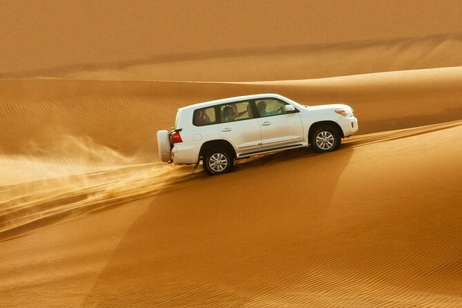Doha: Desert Safari, Sand Boarding, Camel Ride & Inland Sea - Sealine Beach: camels, quad bikes, and first desert views