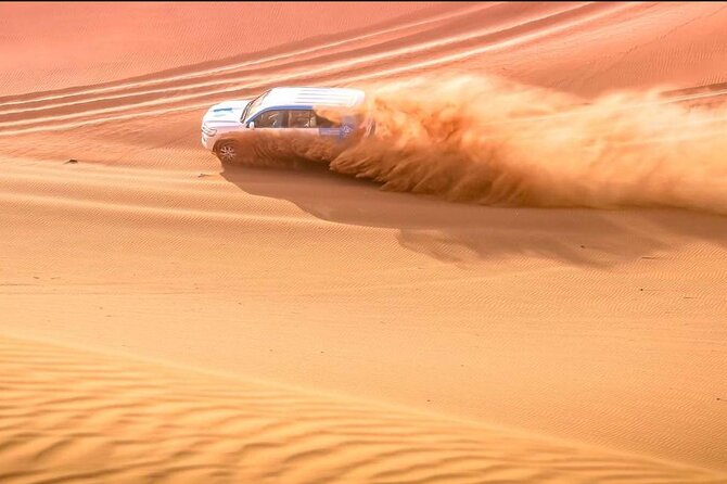 "Doha Desert : Safari, Sandboarding, Camel Ride & Inland Sea" - Tea and a short camel ride in the desert