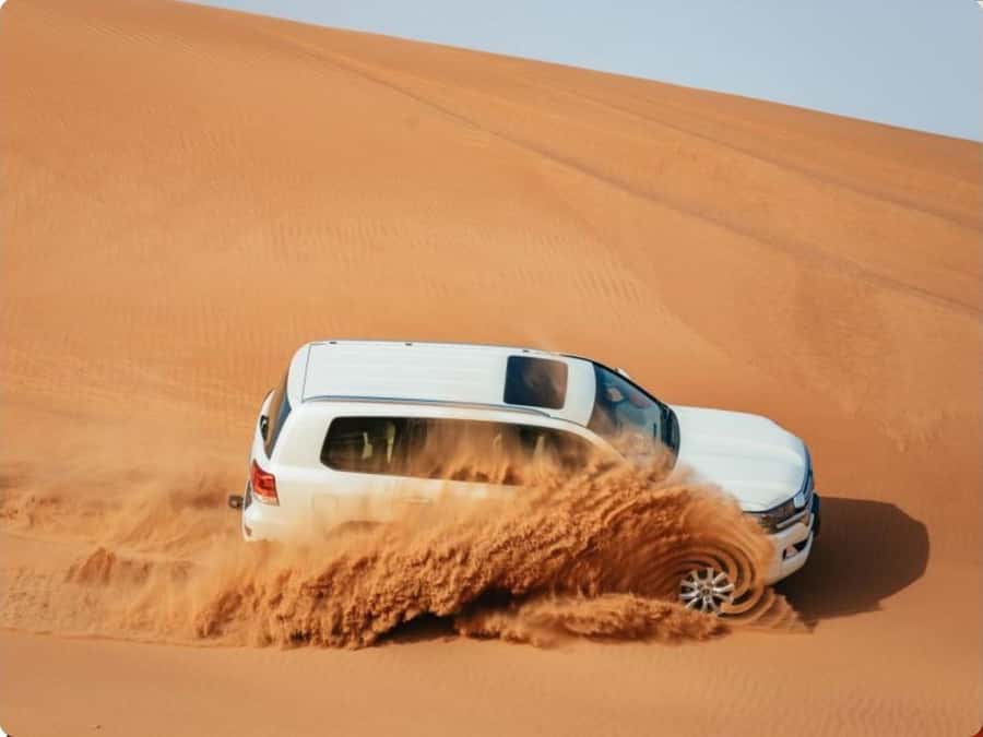 Doha:Desert Safari with Camel Ride, ATV Bike,& Sand Boarding - A gentle camel ride before the engines start