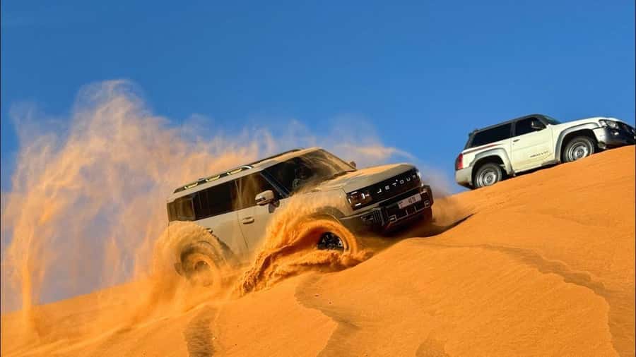 Doha: DesertSafari with Quad Bike, Camel Ride & Sandboarding - Khor Al Adaid, where the dunes meet the sea