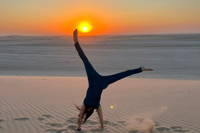 Doha Half Day Desert Safari Dune Bashing Camel Ride Sandboarding - Sunset on the way back to Doha