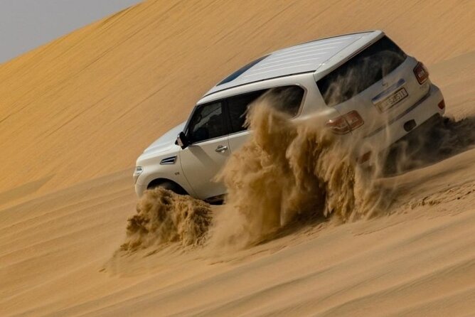 Doha Half Day Desert Safari Dune Bashing Camel Ride Sandboarding - Khor Al Udeid, where the dunes meet the Gulf