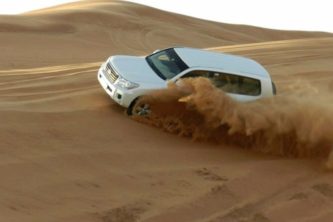 Doha Half Day Desert Safari Dune Bashing CamelRide & Sandboarding - A half-day route from Doha to Sealine Beach