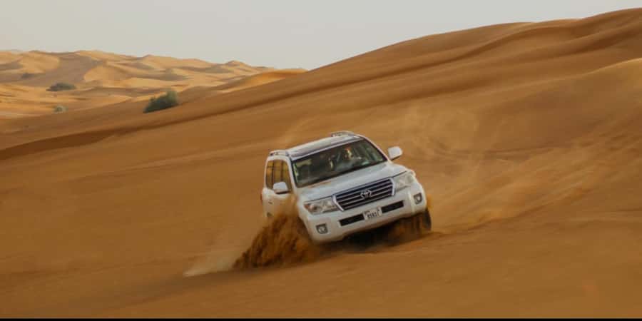 Doha: Half Day Desert Safari With Camel Ride & Sand Boarding - Leaving Doha for Qatar’s red dunes