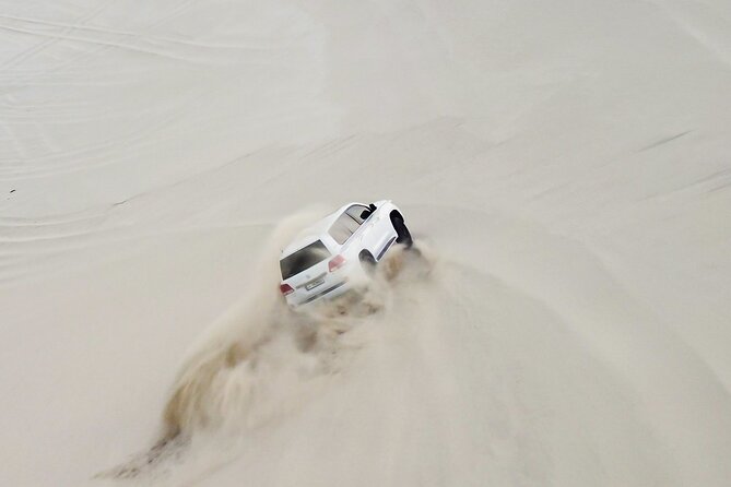 Doha-Half Day Safari with Quad Bike ATV/Camel Ride/sandboard - The 30-minute 250cc ATV ride