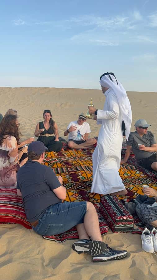 Doha: inland sea Tour With Dune Bashing &Sandboarding fun - A short camel ride with extra costs