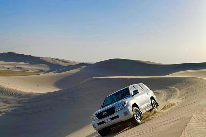 Doha Layover Desert Safari, Camel Ride, Sand Boarding, Inland Sea - A camel ride with a little surprise