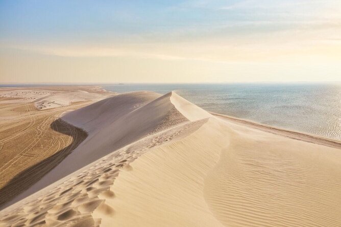 Doha Layover or Doha Stopover Tour with Desert & City Tour - Three hours across Qatar’s desert