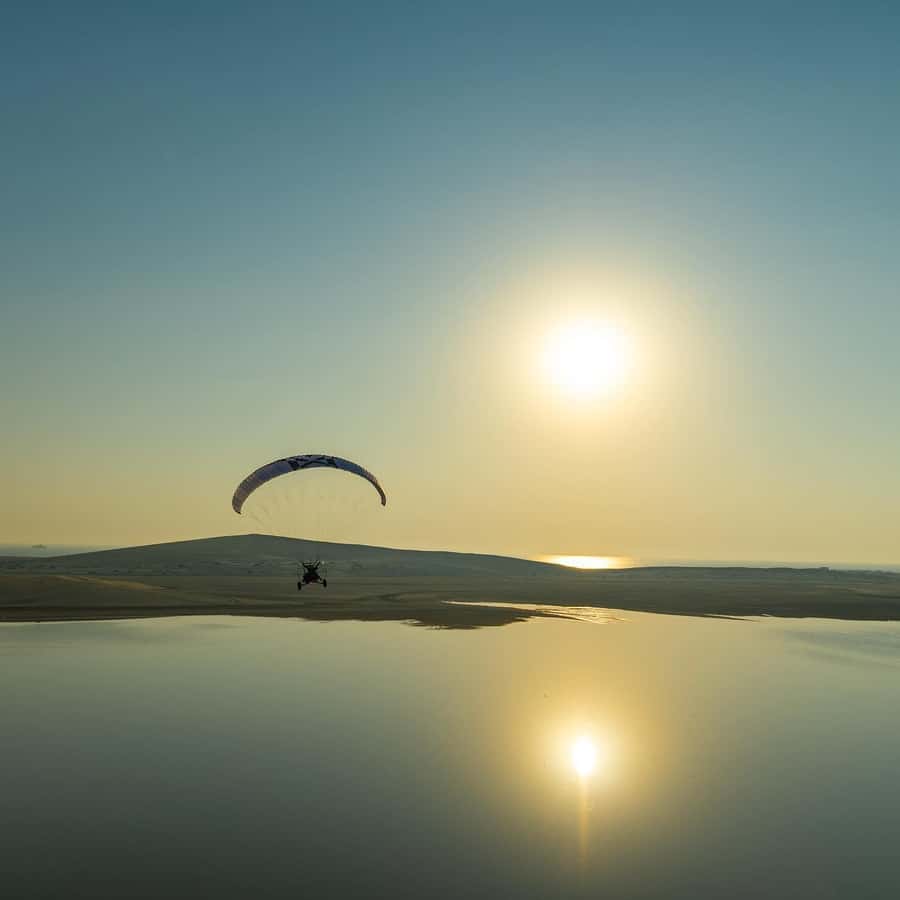 Doha: Paratrike Air Tour with Hotel Pickup and Drop-off - Flying low over Sealine beach
