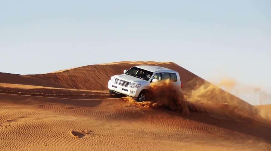 Doha : Private Desert Safari With Camel Ride & Sand Boarding - Sandboarding and 105 minutes of desert action