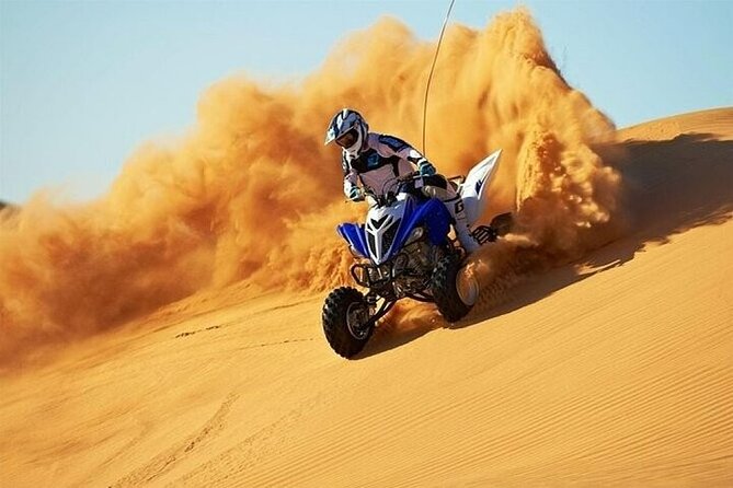 Doha Qatar ATV, Quad Or Buggy, DuneBashing,CamelRide,Sandboarding - Quad biking across the high dunes