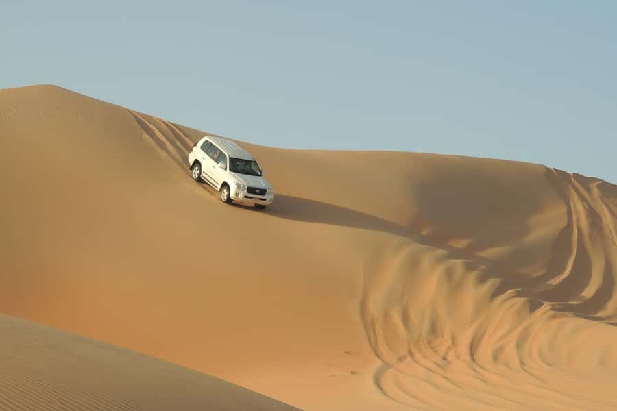 Doha Safari: ATV Ride, Dune Bashing, & Sandboarding Fun - ATV riding at the first desert stop