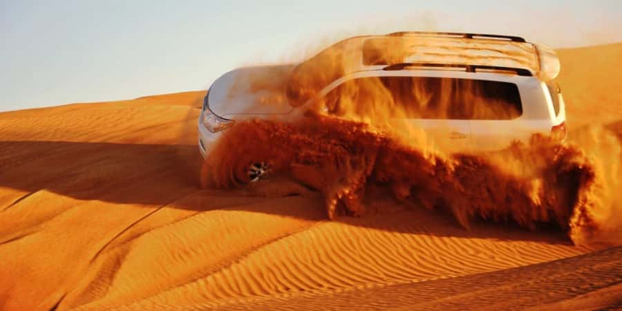 Doha: Safari, Camel Ride, Sandboarding and Inland Sea Tour - Dune bashing: Qatar’s roller coaster on sand