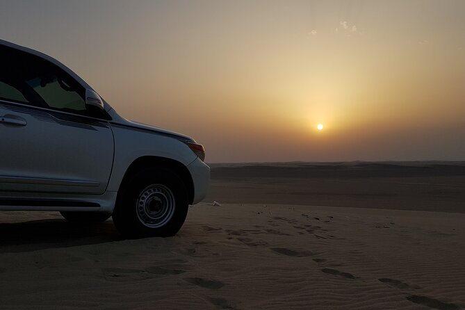 Doha: Sunrise /Sunset Desert Safari with Sand Boarding,Camel ride - Khor Al Udaid and the Arabian Gulf
