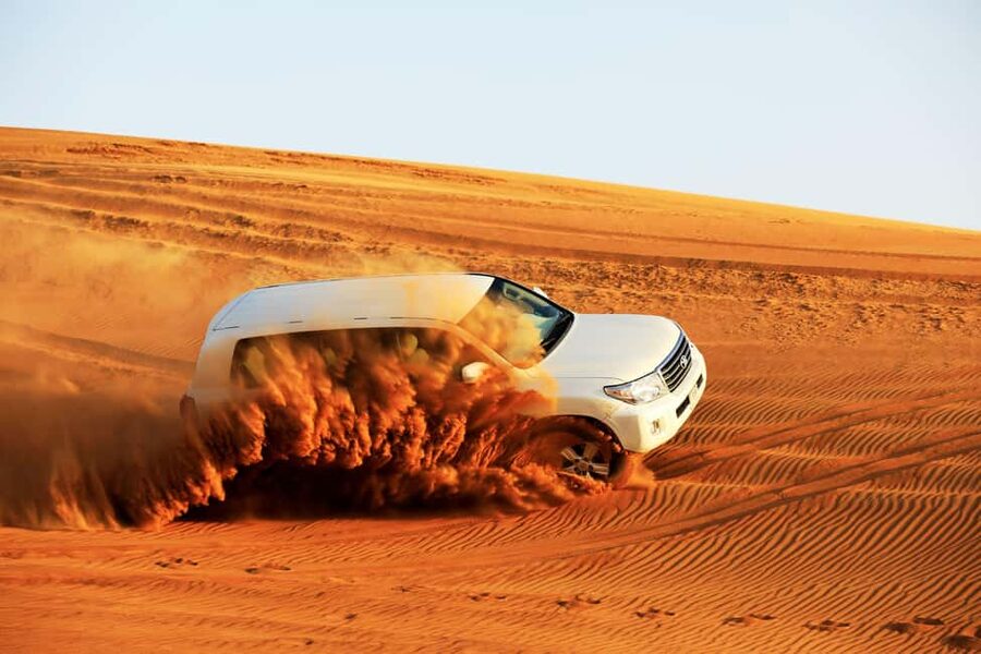 Doha: Sunset Desert Safari, ATV, Camel Ride and Sandboarding - Optional Quad Biking for More Control