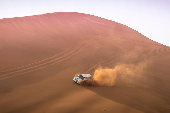 Doha: Sunset Desert Safari, Camels, Sandboarding & Inland Sea - Dune bashing brings the main rush