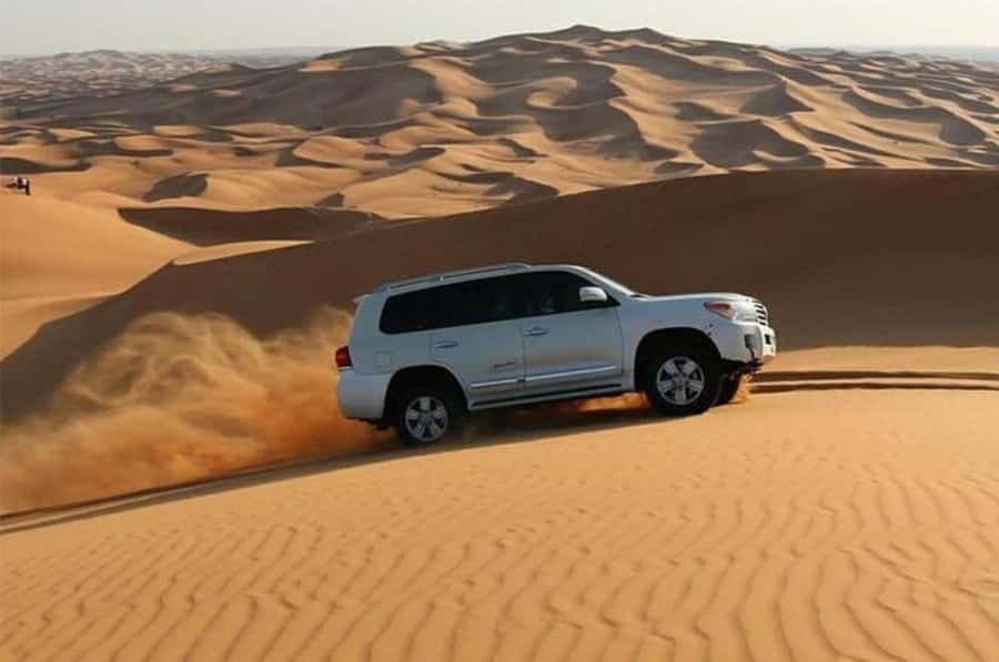 Dune Bashing &Beyond The Ultimate Desert Safari From Doha - Leaving Doha for the open desert