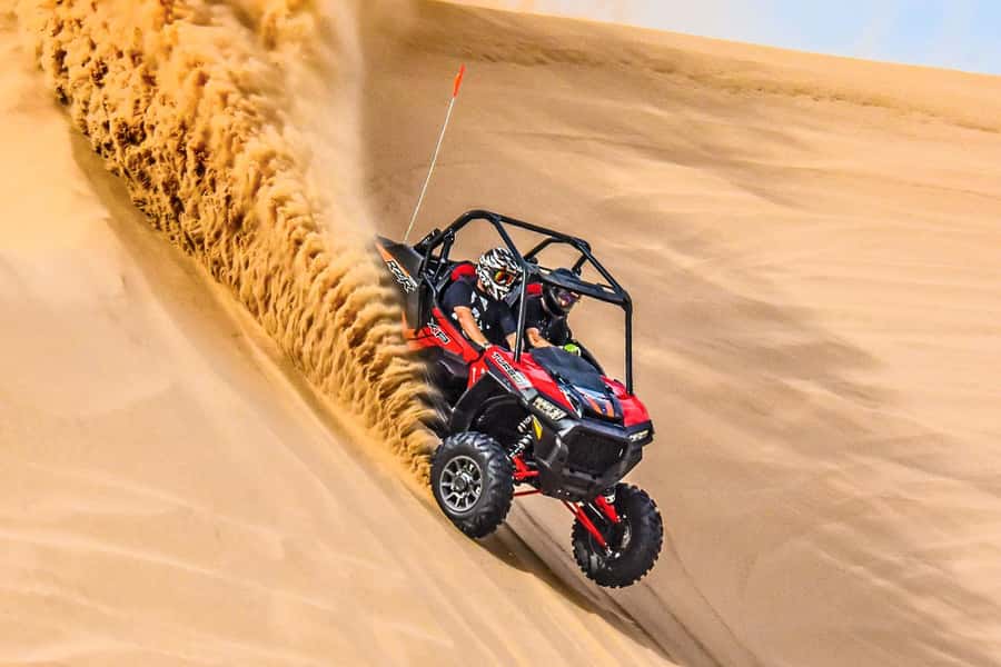 Dune Bashing &Beyond The Ultimate Desert Safari From Doha - Sandboarding and the short camel ride