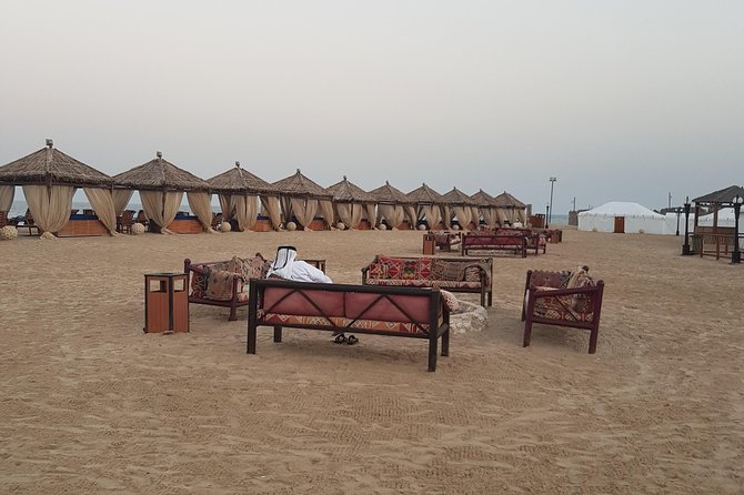 Full Day Desert Safari with Buffet Dinner,Sand Boarding & Camel Ride - Sealine Beach: The Transition From City to Sand