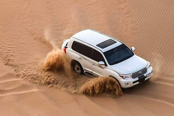 Full Day Desert Safari with Camp Access, Buffet Dinner,Camel Ride - Khor Al Udaid brings desert and sea together