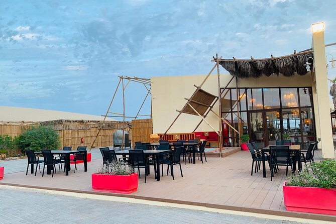 Full-day Qatar desert safari: dune bashing, sandboarding, camels - Singing Sand Dunes and a strange desert sound