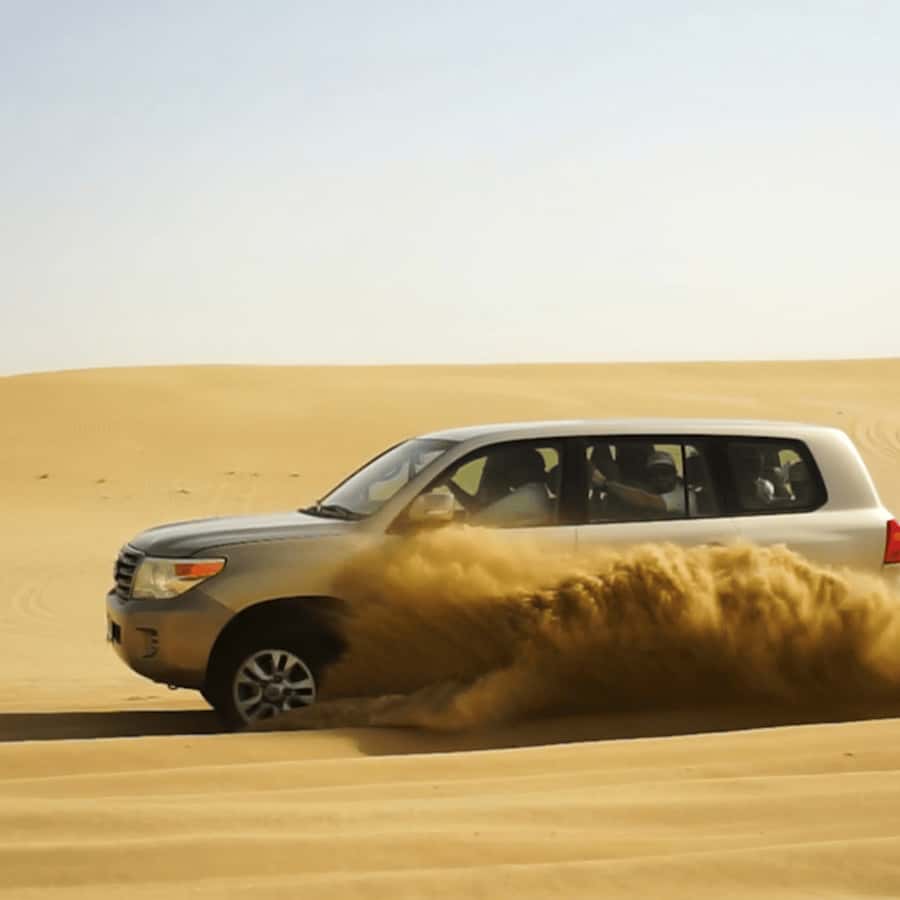 Half-Day Desert Safari For Cruise Ships Passngers. - A five-minute camel ride at the camp