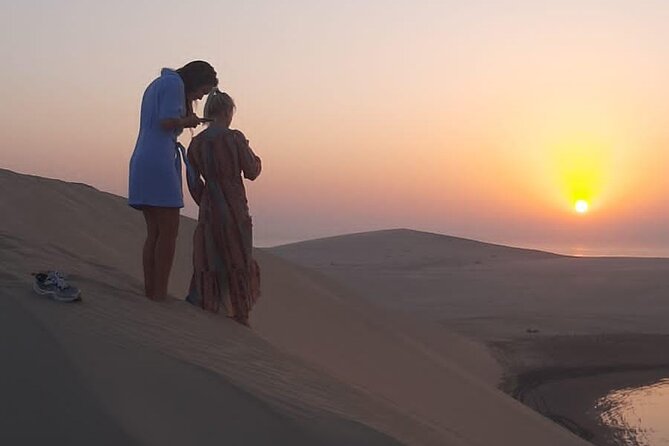 Half Day Private Desert Safari in Doha - Sandboarding, camel rides, and desert stops