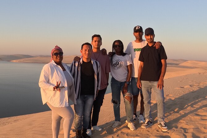 Half Day Safari Tour With Camel Ride and Sand Boarding in Doha - Sandboarding on open dunes