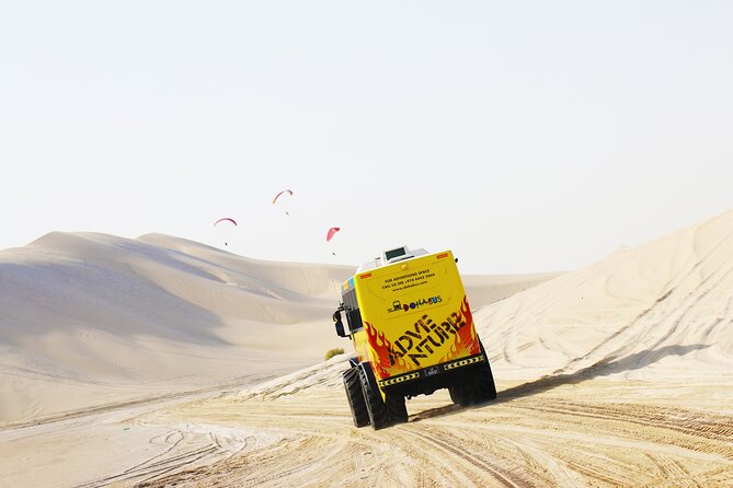 Monster Bus desert adventure: Dune bashing and sandboarding - Leaving Doha for Sealine