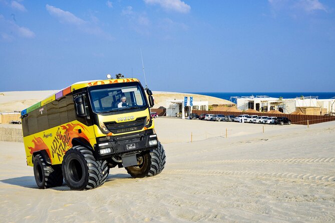 Monster Bus desert adventure: Dune bashing and sandboarding - Photo stops where sand meets the sea