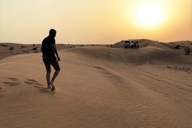 No Rush Desert Safari: 6-Hour Adventure & Inland Sea Relaxation - A short camel ride and sandboarding stop