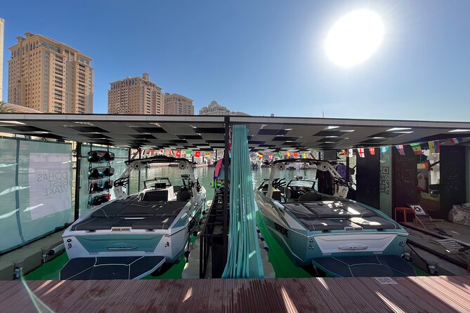 Private Wakesurfing or Wakeboarding along Doha's skyline - The value of $239 for up to six people