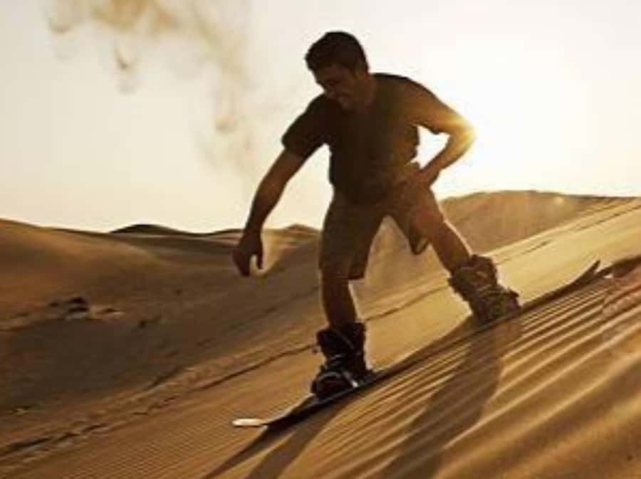 Qatar Desert Safari, Quad bike, Camel Ride and Sandboarding - Dune bashing across the sand for 30 minutes