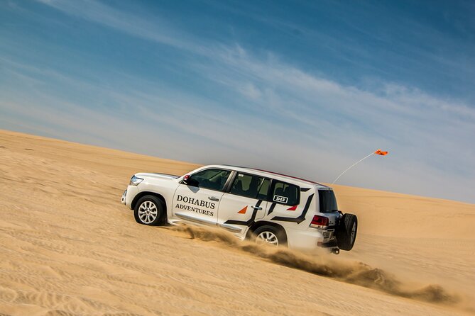 Qatar Half Day Desert Safari(Camel Rides & Sandboarding) - From Doha streets to open Qatar dunes