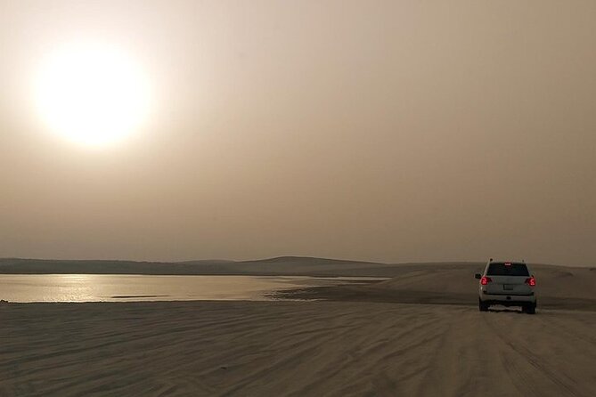 Qatar Sunset Desert Safari: Dune Bashing & Golden Sands Adventure - The camel camp: a short, paid extra stop