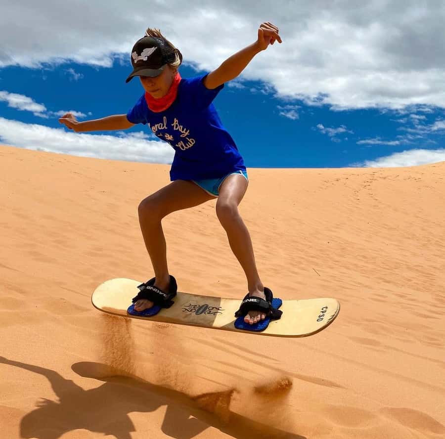 Relax Inland Sea Tour, Desert Safari, Camel Ride, SandBoard - Sandboarding on the High Dunes