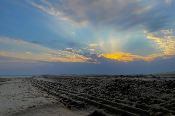 Special Private Arabic Setup with Desert safari experience. - An Arabic meal over the dunes