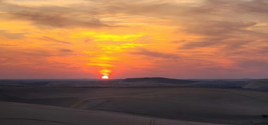 Sunrise or Sunset desert Safari with Sandboarding in Qatar - Sandboarding on the dunes